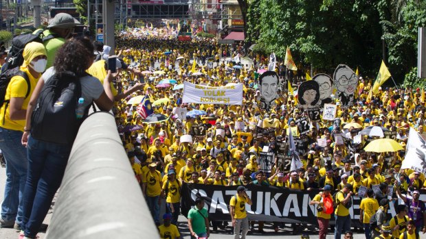 Activists from the Coalition for Clean and Fair Elections (Bersih) march during a rally in Kuala Lumpur, Malaysia, on Saturday.