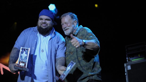 Briggs receives the awards for Best Album (Sheplife) and Best Video (Bad Apples) from Jack Thompson at the National Indigenous Music Awards in Darwin.