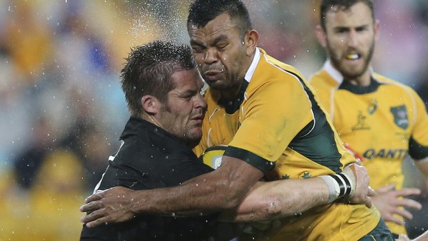 No inch given: Richie McCaw and Kurtley Beale leave their mark in 2014.