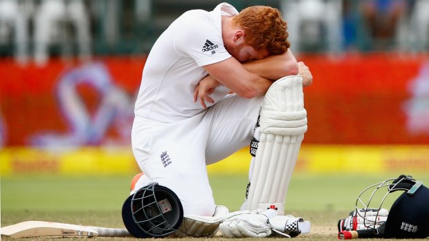 Jonny Bairstow of England takes a break as he waits a stumping decision during day five.