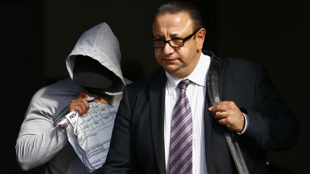Mohammed Alameddine leaves Bankstown Court with his lawyer Elias Tabchouri