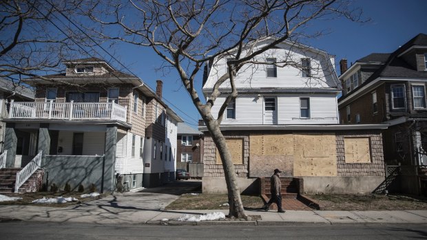 Two homes that were owned by Karen Connors, who died in 2011, in the Rockaways neighbourhood of Queens, New York.