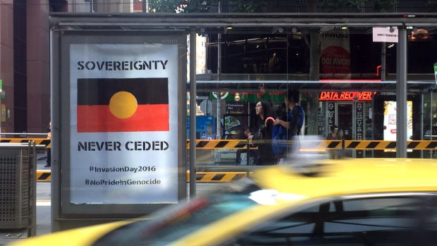 One of the anti-Australia Day posters outside Southern Cross Station on Spencer Street.