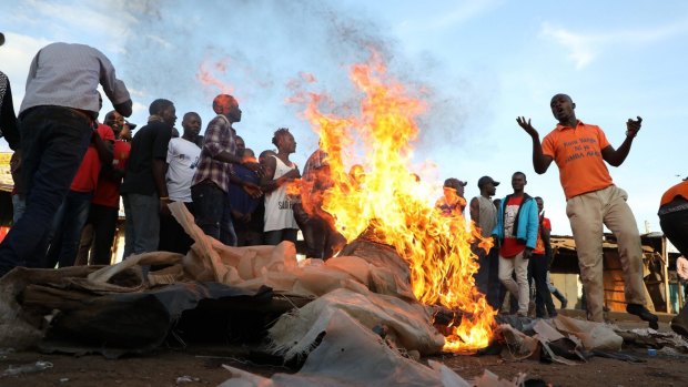 Kenyan opposition supporters burn tyres and other items in Kawangware, Nairobi on Monday.