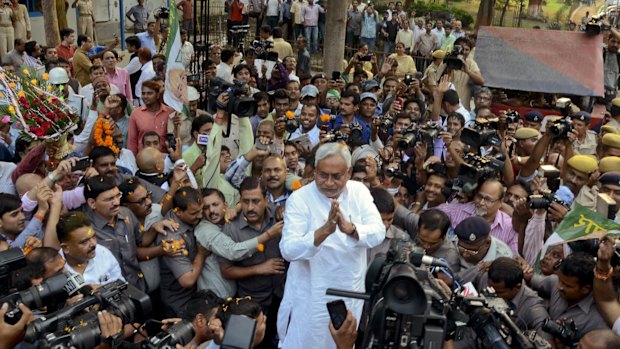 Bihar Chief Minister Nitish Kumar, centre, surrounded by media earlier this month. 