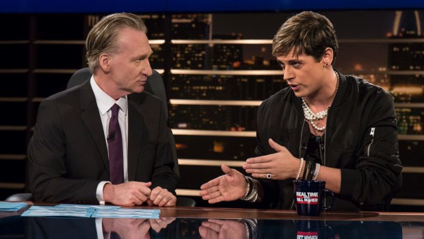 Bill Maher, left, listens to Milo Yiannopoulos, a writer for Breitbart News, on HBO's Real Time with Bill Maher.