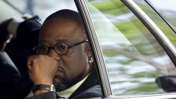 Anthony Scott, brother of Walter Scott, waits in a limousine before departing the W.O.R.D. Ministry Christian Center in Summerville, South Carolina.