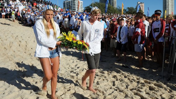 A memorial service is held for Matthew Barclay at Kurrawa Beach, on the Gold Coast.