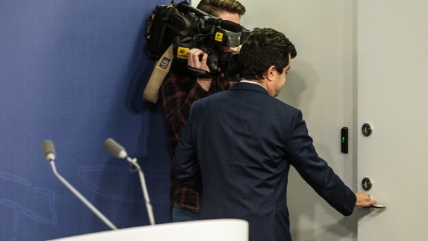 Senator Dastyari leaves after his short resignation statement.