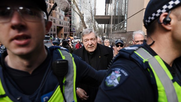 Cardinal George Pell makes the trip from his lawyers' offices to Melbourne Magistrates Court.