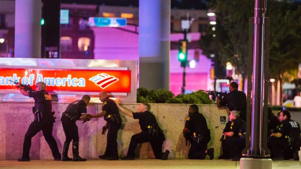 Dallas police respond after shots were fired at a Black Lives Matter rally on July 7. Micah Johnson killed five officers and wounded nine others and two civilians  in the attack.