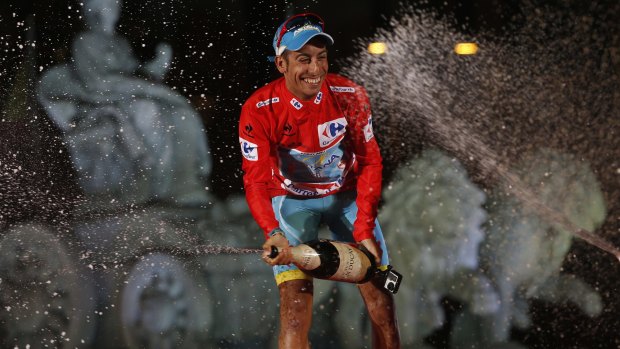 Astana's Fabio Aru sprays cava (Spanish wine) in front of the Cibeles statue in Madrid after winning the Tour of Spain.