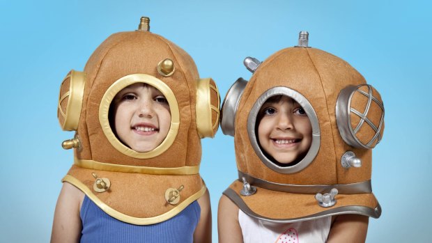 Children playing dress up at the <i>Voyage to the Deep</i> exhibition at the Australian National Maritime Museum.