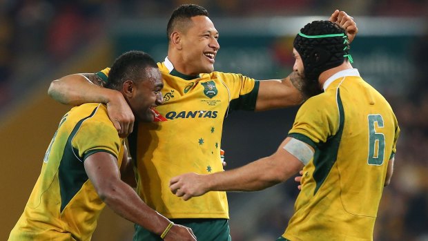 Match winner: Tevita Kuridrani, Isreal Folau and Scott Fardy rejoice at full-time.