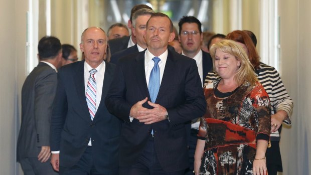 Eric Abetz departed the party room meeting by Tony Abbott's side after Abbott lost the leadership ballot.