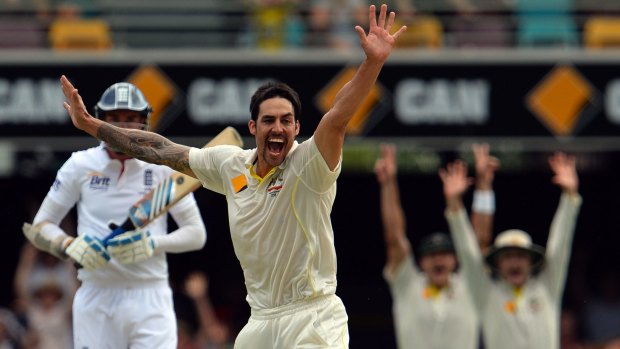 Mitchell Johnson celebrates the dismissal of England's Stuart Broad during the first Ashes Test at the Gabba in Brisbane last year.