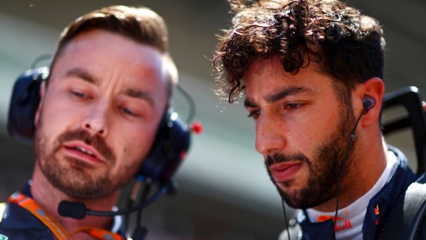 Daniel Ricciardo talks with Red Bull race engineer Simon Rennie.