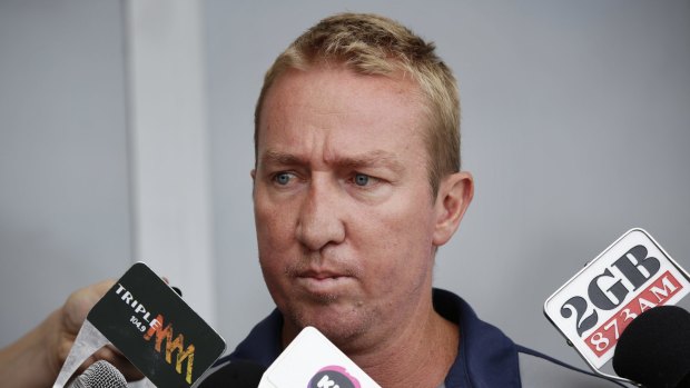 Testing times: Sydney Roosters coach Trent Robinson is grilled by the media recently over the Mitchell Pearce controversy.