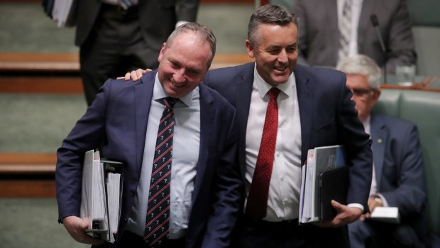 Deputy Prime Minister Barnaby Joyce and the now former infrastructure minister Darren Chester in Question Time in October.