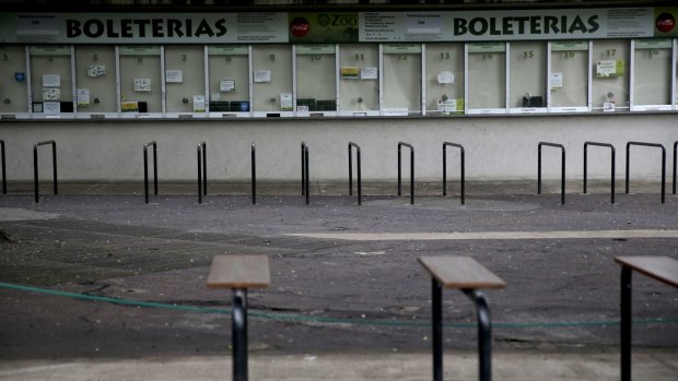 Ticket booths stand shuttered at the former Buenos Aires Zoo in Argentina on Friday.