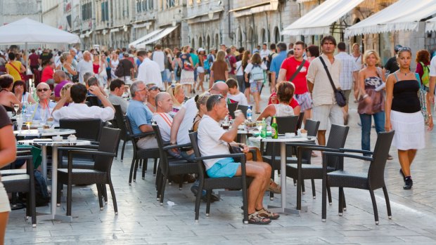 <i>Tourists crowd the streets of Dubrovnik.</i>