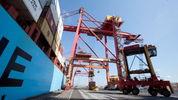 The trade balance fell to a surplus of $460 million in July, about half of the $888 million surplus in June.