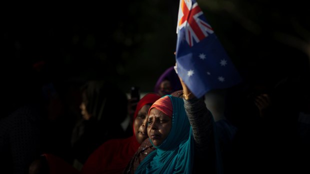 Members of the African community from the nearby housing commission estate joined the protest.