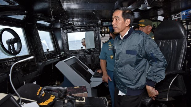 Indonesian President Joko Widodo on the bridge of navy warship KRI Imam Bonjol in the waters of the Natuna Islands in June.