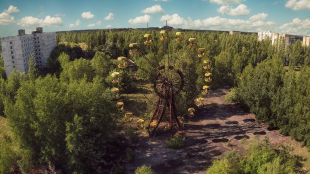 The abandoned town of Pripyat in Chernobyl, featuring the ferris wheel of the amusement park which never opened. 