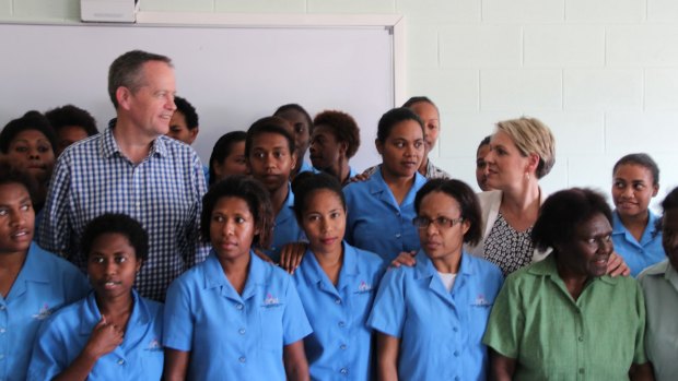 Opposition leader Bill Shorten and his deputy Tanya Plibersek meet with students at a midwifery course that is supported by Australian aid at the Pacific Adventist University in Port Moresby.