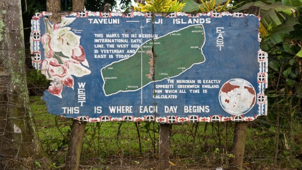 International Date Line sign splitting the island of Taveuni in two, Fiji.