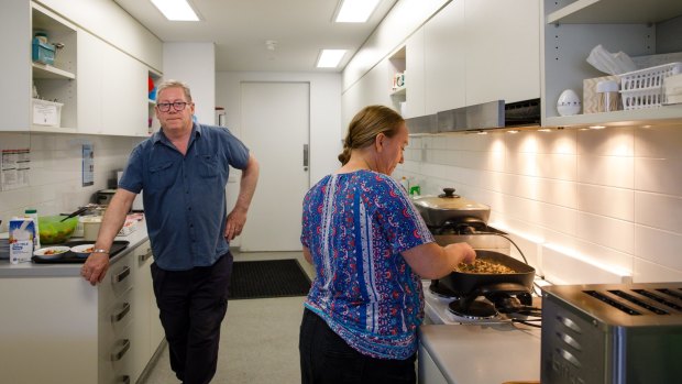 Client referral officers John McDonald and Jade Hudson in the kitchen at Uniting Care in Civic. 