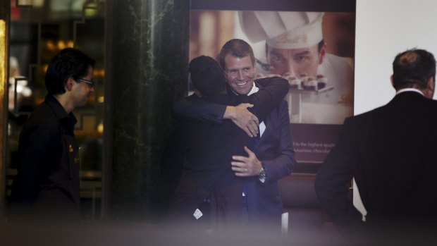 NSW Premier Mike Baird visits the Martin Place Lindt Store as it opens for the first time since December.