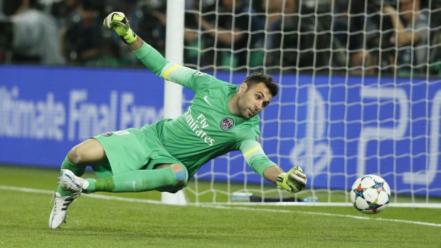 PSG's Salvatore Sirigu is not able to stop Suarez's first goal.