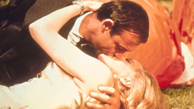 Sean Connery as James Bond, and Honor Blackman as Pussy Galore, in the 1964 movie <i>Goldfinger</i>.  
