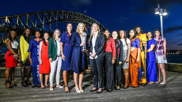Let the games begin: Australian Diamonds captain Laura Geitz (holding the World Cup) with the 15 captains of the teams involved in the netball World Cup.