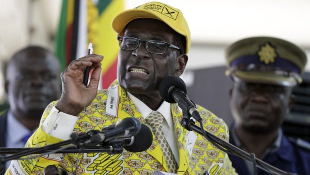 Lashing out: Zimbabwean President Robert Mugabe opens the ZANU-PF National Congress in Harare.