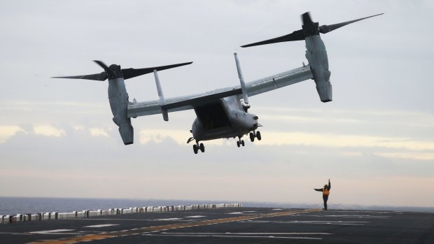 An MV-22B Osprey delivers VIPs for the opening ceremony of Talisman Sabre on board the USS Bonhomme Richard. 