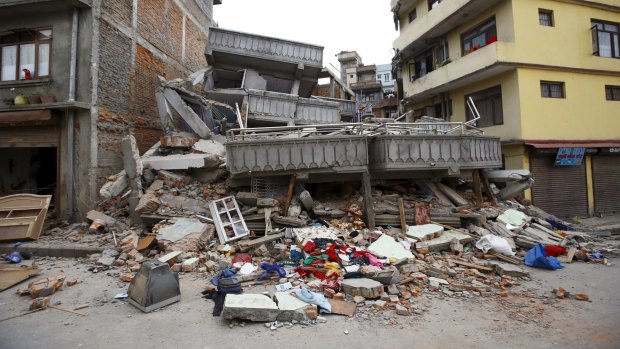A collapsed building is pictured after an earthquake hit, in Kathmandu, Nepal.