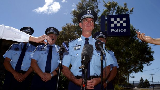 Police Commissioner Andrew Scipione, centre, addresses the media on the death of Sergeant Geoffrey Richardson.