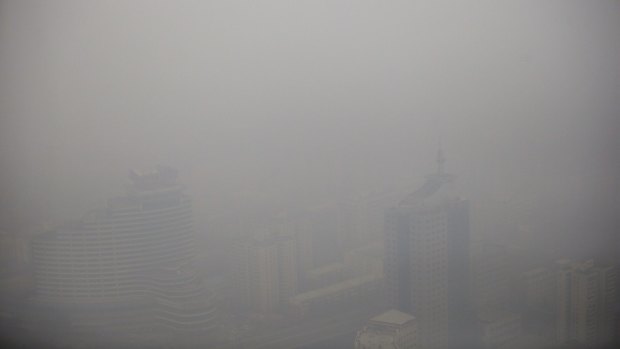 Buildings are seen from China Central Radio and Television Tower on a polluted day in Beijing, January 15, 2015. 