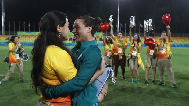 Volunteer Marjorie Enya (L) and rugby player Isadora Cerullo of Brazil became engaged on the field.
