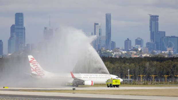 A water-cannon salute for the first flight.