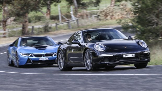 Speed kings: The Porsche 911 Carrera S leads the BMW i8.