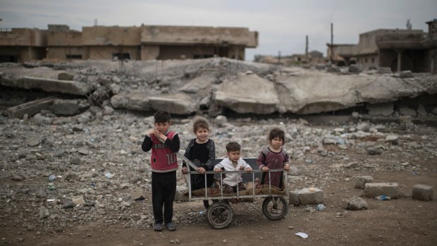 Children in the west of Mosul, Iraq, last month.