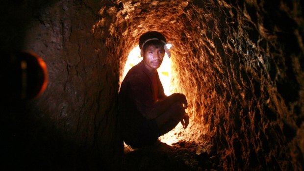 A small-scale miner working in Didipio, 270 kilometres north of Manila in the Philippines. Human Rights Watch says mines are now employing child labourers.