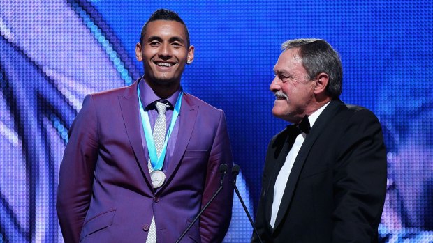 Nick Kyrgios on stage with John Newcombe.