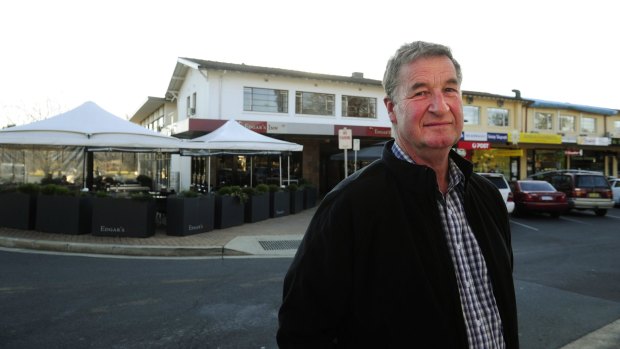 Jeff Darwin has hired a contractor to remove the loose-fill asbestos above Edgar's at the Ainslie shops in October. 