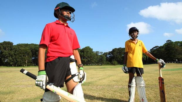 On their guard: Young players Aroon Patha and Akash Yousuf practise at Centennial Park.