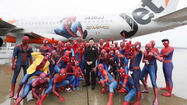 The Spider-Man fans ready to board in Tokyo.